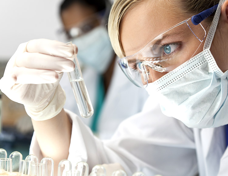 Woman testing chemicals